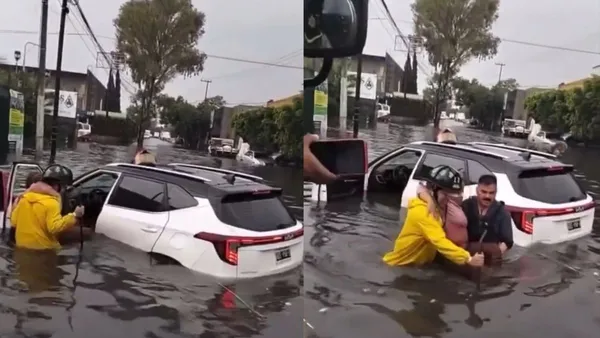 Bomberos y policías de Tlalnepantla rescatan a mujer que quedó atrapada en una inundación