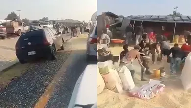 Rapiñan maíz de tráiler volcado en la México-Tulancingo