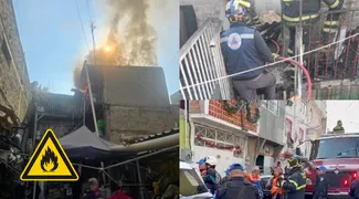 Bomberos trabajan en la casa afectada por el incendio que dejó dos personas heridas en la Agrícola Oriental.