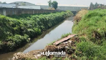 Temporada de lluvias preocupa a vecinos de Totoltepec, piden desazolve de canal