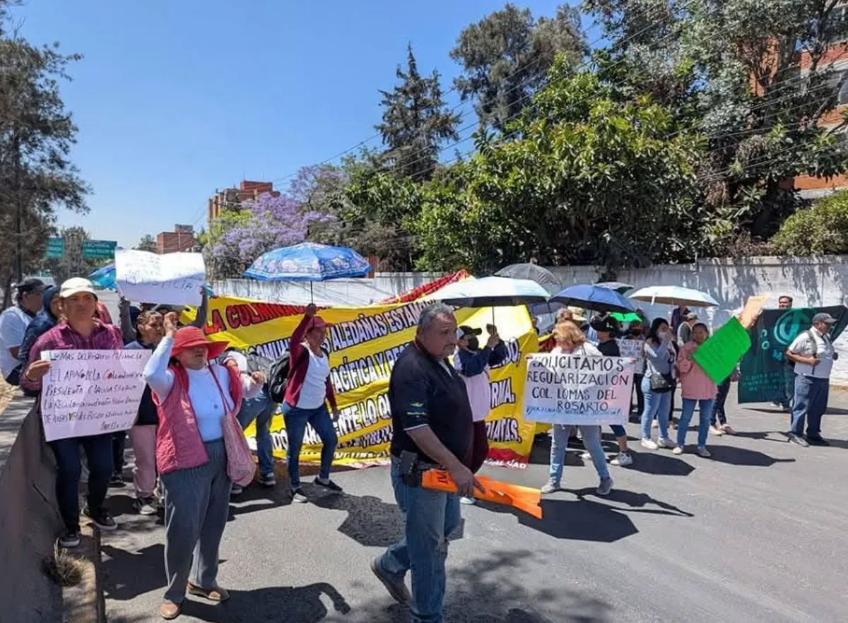 Bloquean autopista México-Querétaro, exigen regularización de predios
