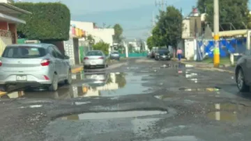 Vecinos de Tultepec piden reparar la gran cantidad de baches