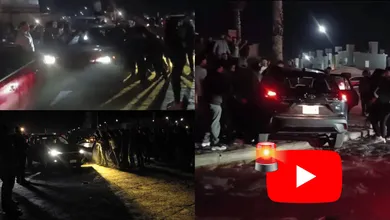 Aficionados rodean el vehículo del conductor señalado de atropellar a varias personas durante una celebración en Zempoala.