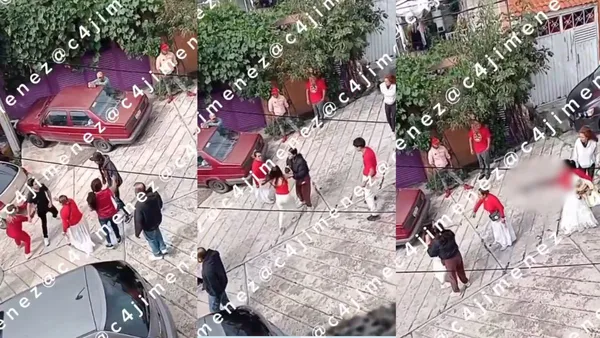Mujer apunta con arma larga mientras cargaba a un bebé durante riña en Naucalpan [VIDEO]
