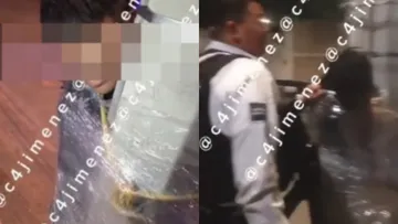 En redes sociales circula un video en el que se observa a un ladrón emplayado y atado con cuerda a un poste.
