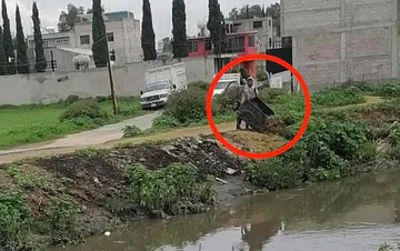 Sujeto arrojando basura