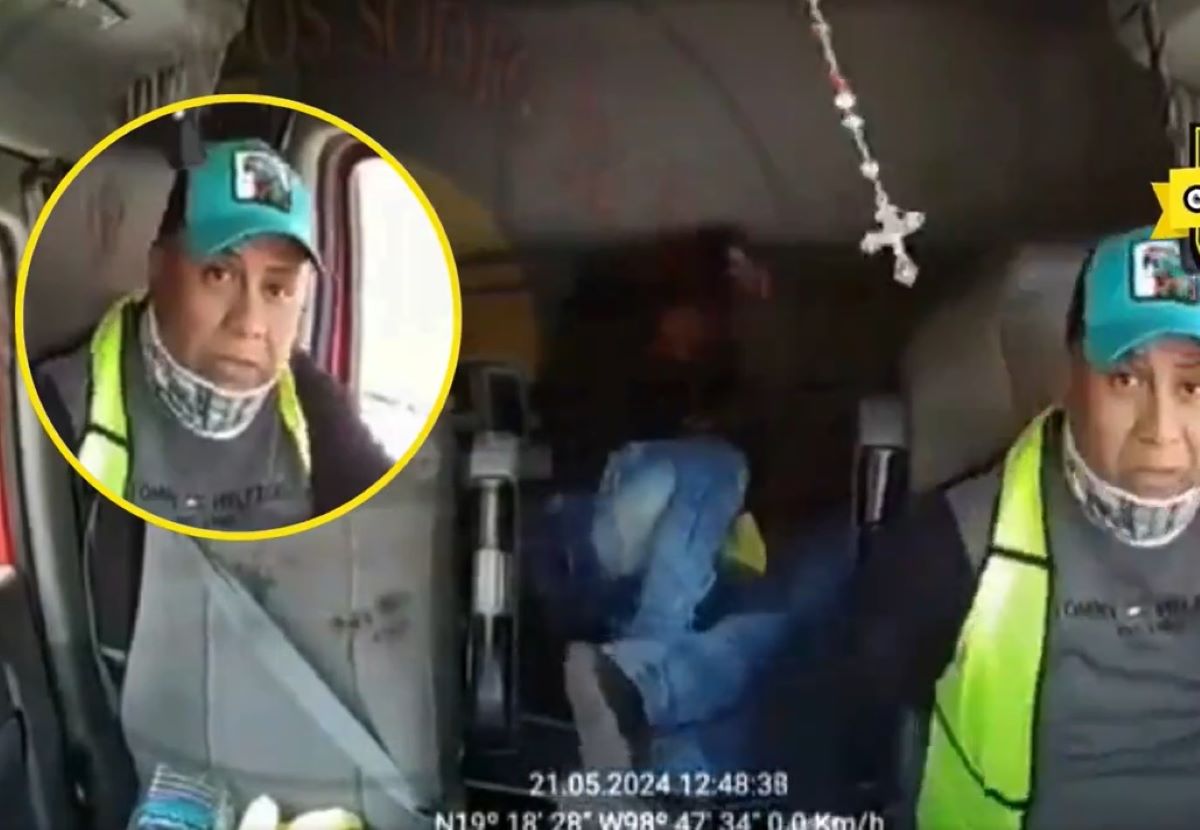 El video de vigilancia que llevaba el tráiler y que se está haciendo viral en redes sociales, muestra cuando dos maleantes suben a la cabina y someten al chofer. Foto: Captura